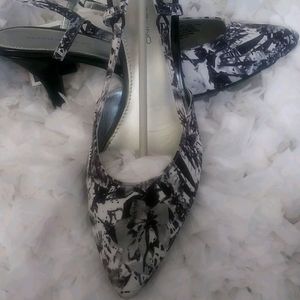 Black and white sandals with back strap